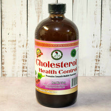 Bottle of 'Cholesterol Health Control' on a wooden surface