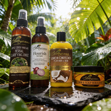 Set of Adiva Naturals hair care products for growth and support with a tropical leaf background