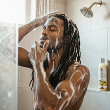 Coconut Avocado Shampoo and Body Wash - Full Lather with black man in shower washing locs and lather up body