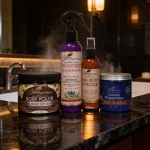 Set of All Vanilla Sandalwood Adiva Naturals Hair and Skin Care products on a bathroom counter with a mirror in the background.