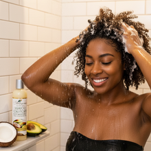 Coconut Avocado Shampoo Body wash - Lifestyle Black woman washing her curly hair in shower