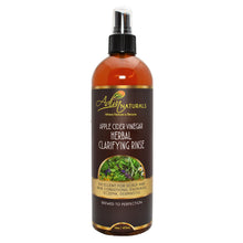 Bottle of Apple Cider Vinegar Herbal Clarifying Rinse with a brown label on a white background